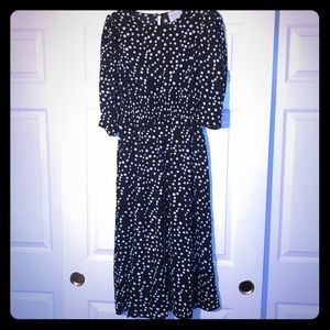 Classy black and white polkadotted midi dress